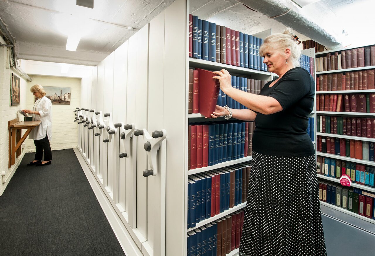 Mobile shelves on tracks - Christie's example.