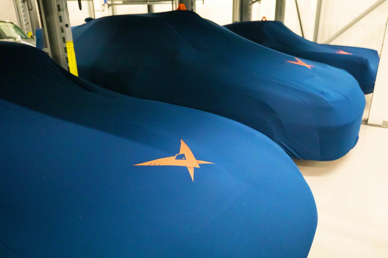 Car storage mezzanine floor - pursuit racing - car covers.