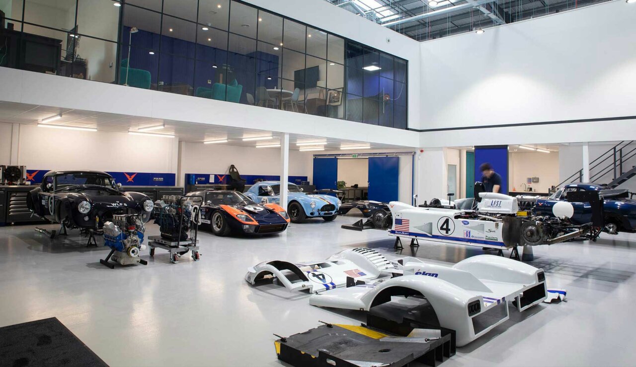Car storage mezzanine floor - pursuit racing - showroom.