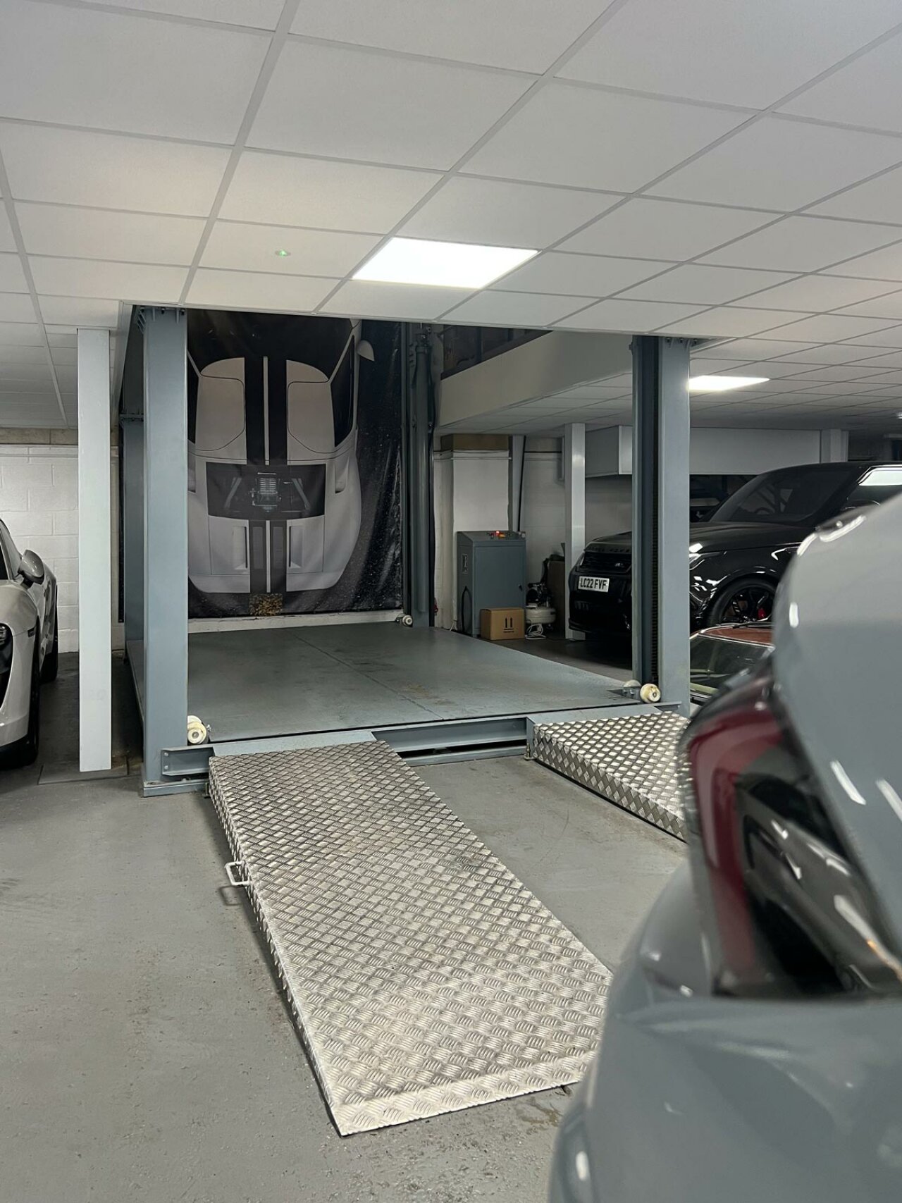 Regency - Automotive relocation - car lift.