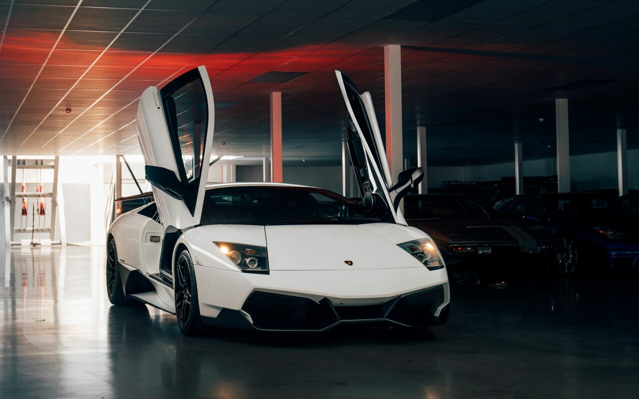 V Management - automotive mezzanines - classic car storage - white lamborghini.